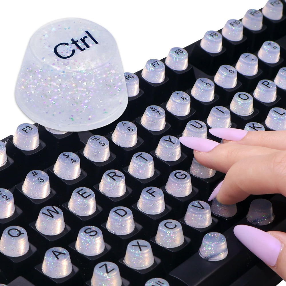 Raised Button front packaging showing glittered silicone keycaps and set benefits