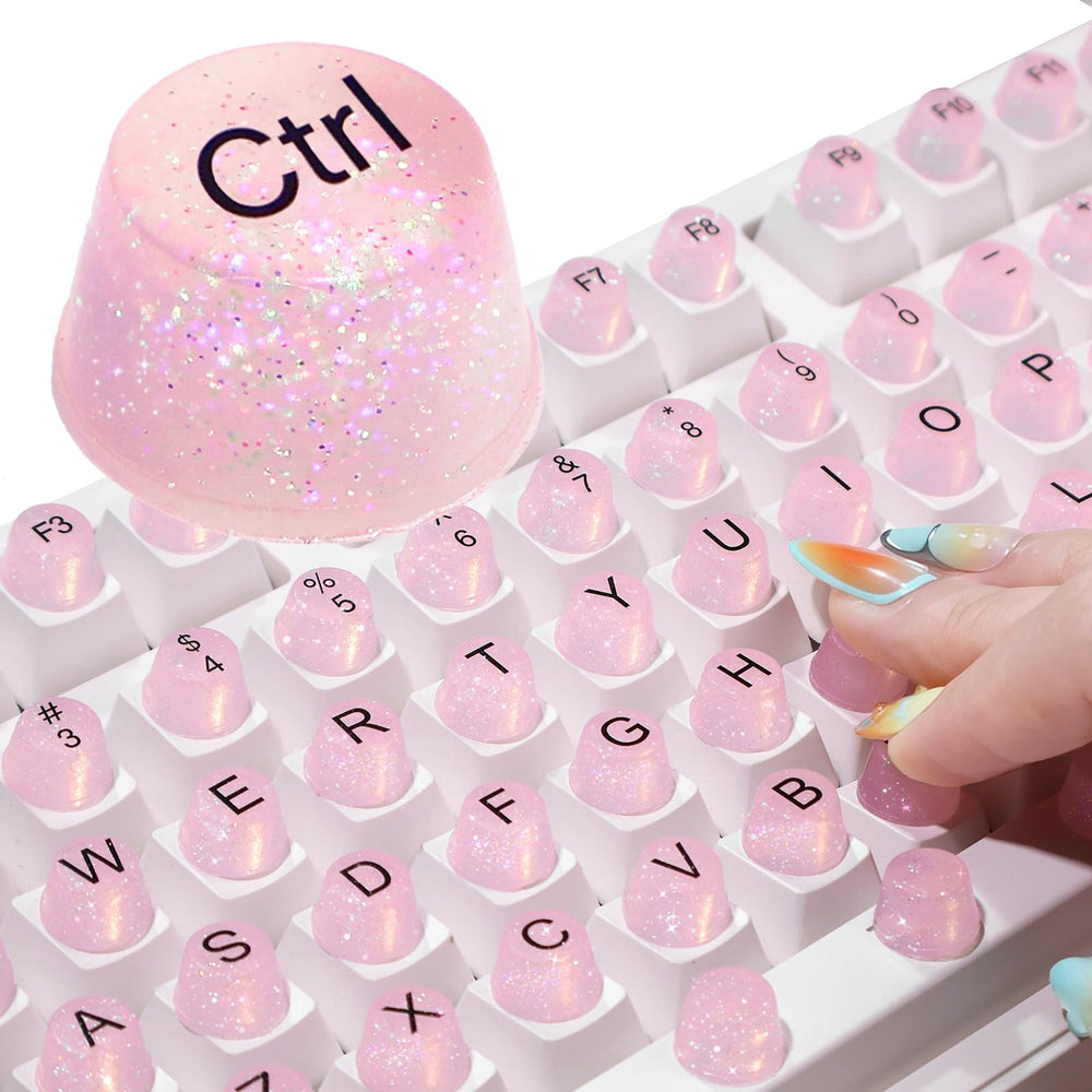 Raised Button front packaging showing glitter silicone keycaps and benefits