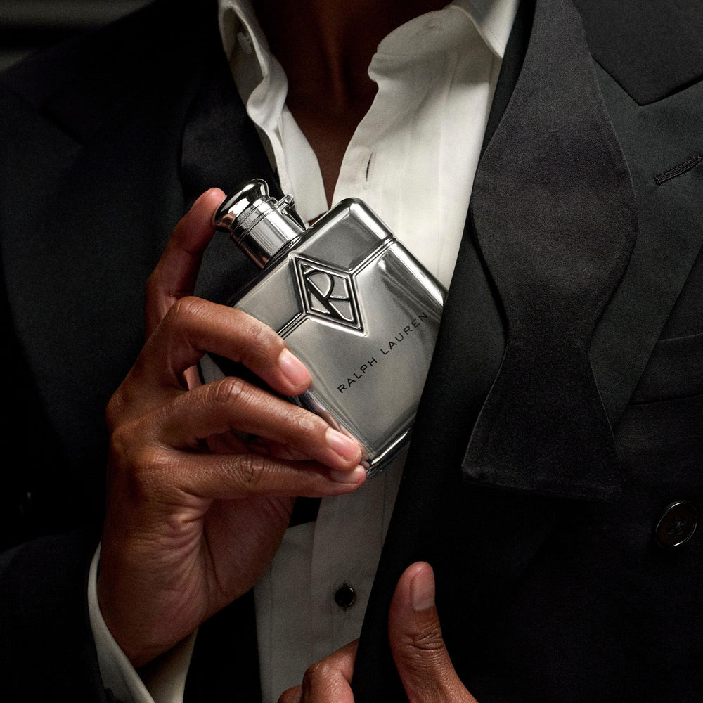 RALPH LAUREN FRAGRANCES spray in hand demonstrating portable use benefit: easy touch-ups