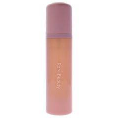 Rare Beauty spray nozzle detail demonstrating fine mist for even, lightweight application