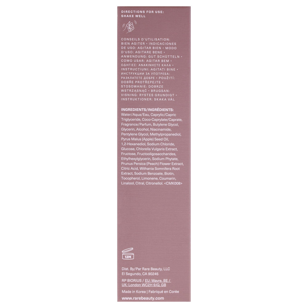 Rare Beauty texture close-up of fine mist conveying delicate coverage and quick dry benefit