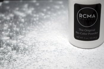 RCMA Makeup jar beside common items for size comparison and travel convenience