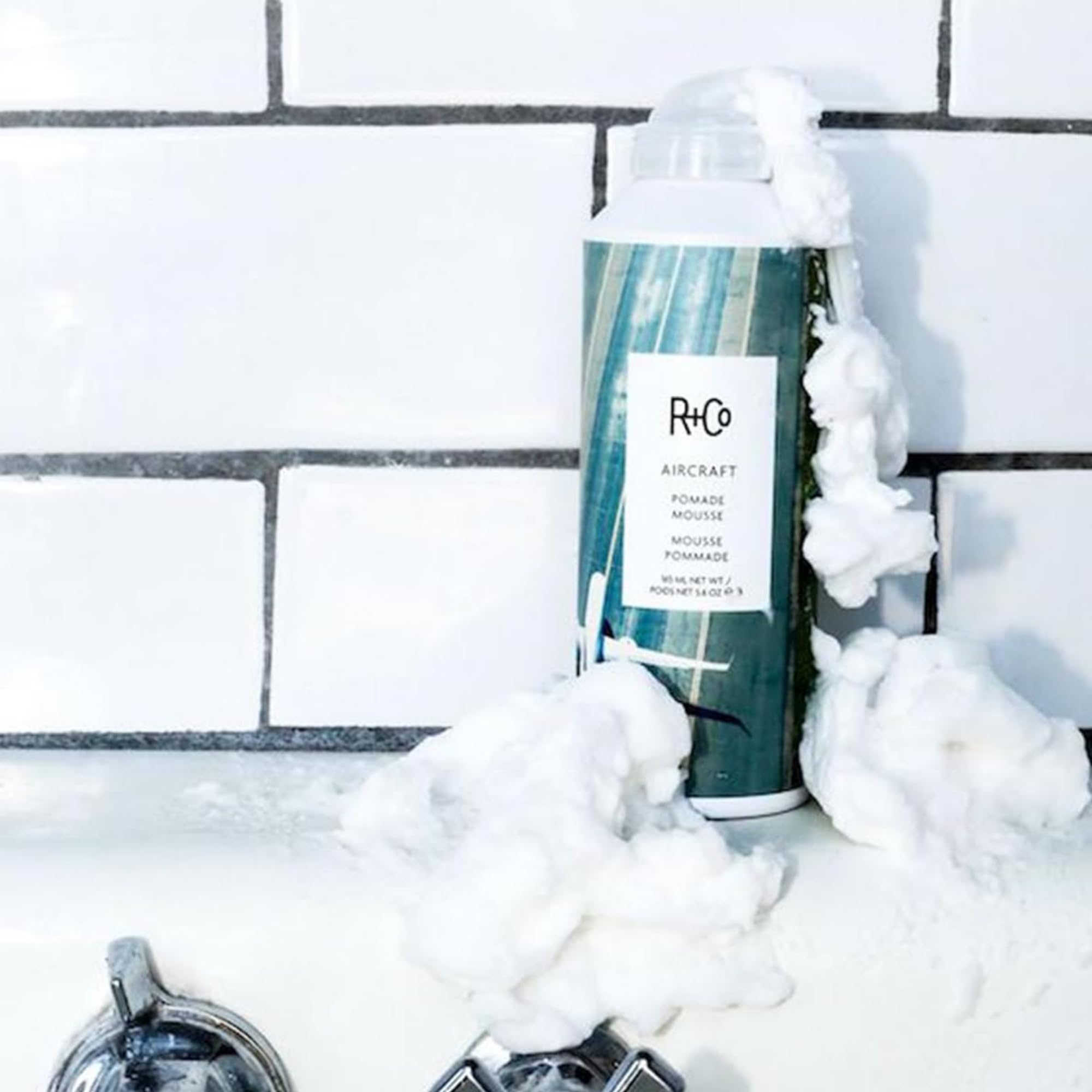 R+Co aircraft applied to wavy hair during styling to create separation and natural lift