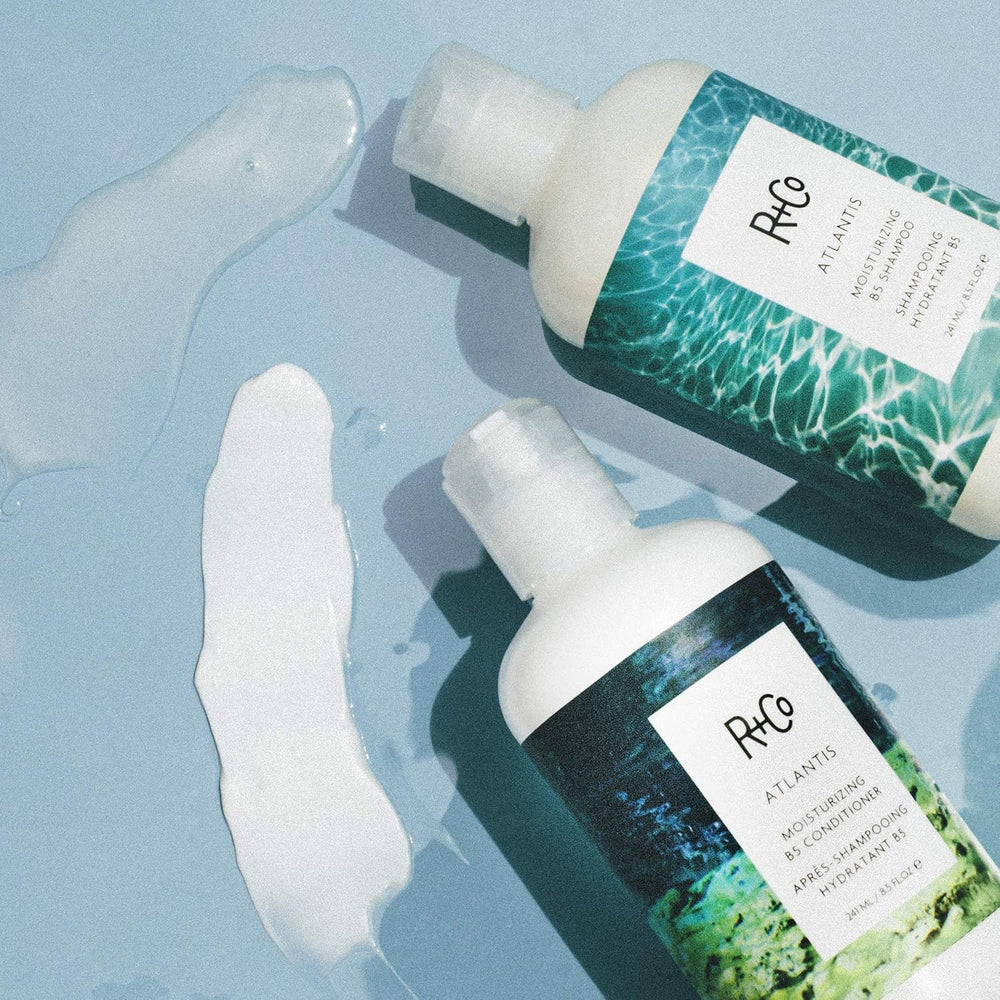 R+Co ATLANTIS in-shower application on wet hair demonstrating detangling benefit