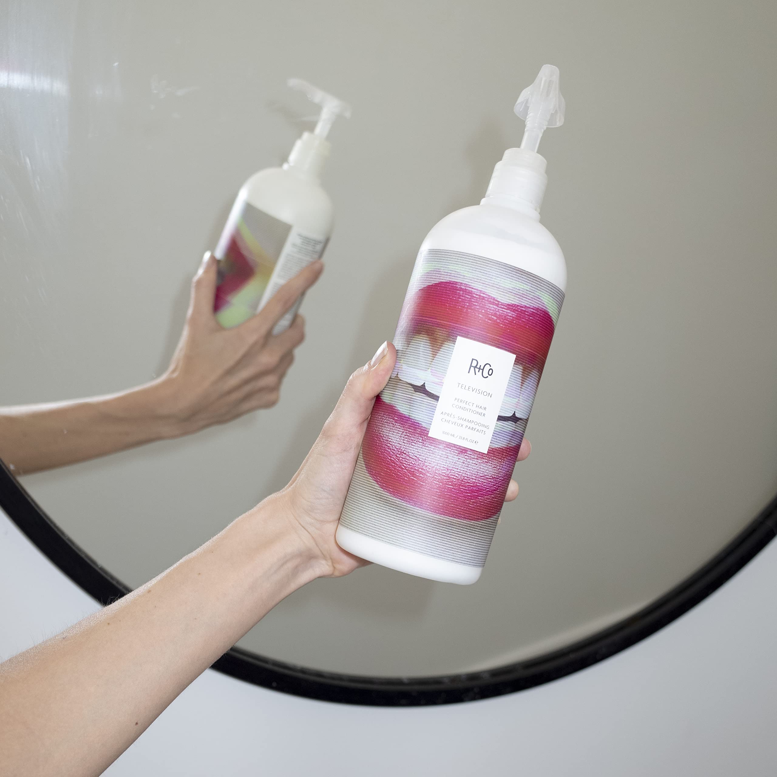 R+Co pump close-up on TELEVISION conditioner for easy dispensing benefit