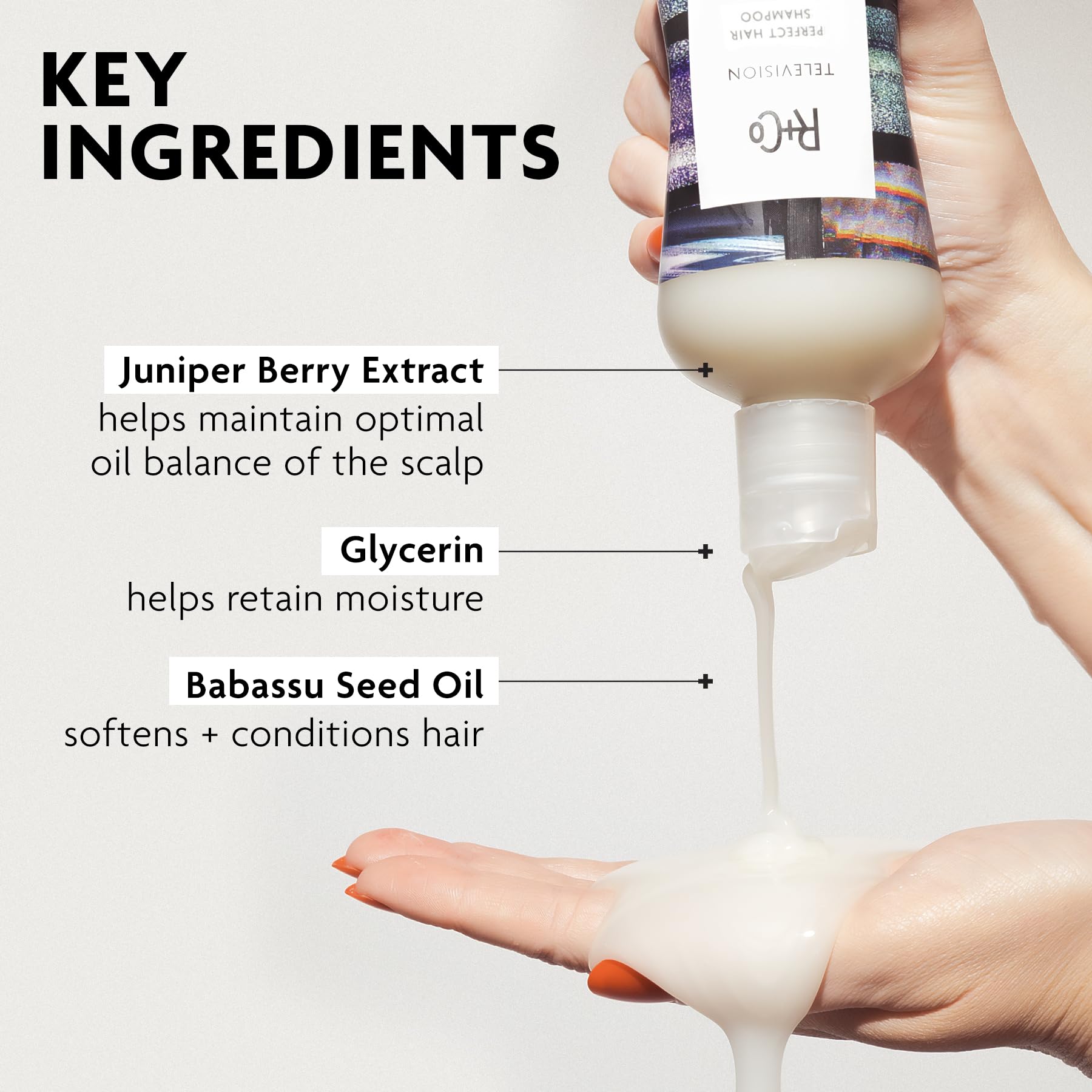 R+Co TELEVISION bottle in hand illustrating compact 2.0 oz size for travel convenience