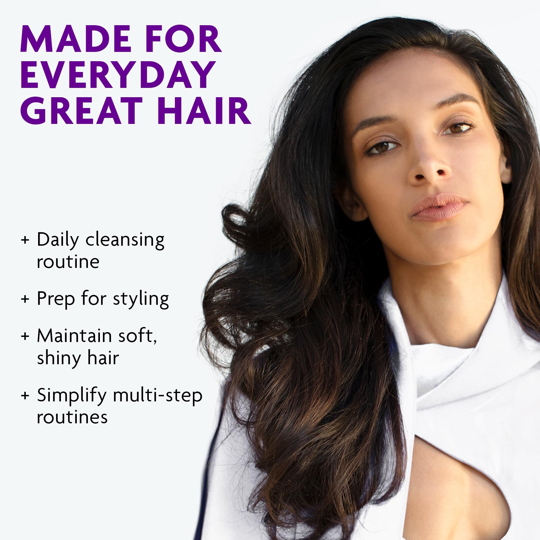 R+Co TELEVISION shampoo applied to hair showing conditioning action and smoother strands