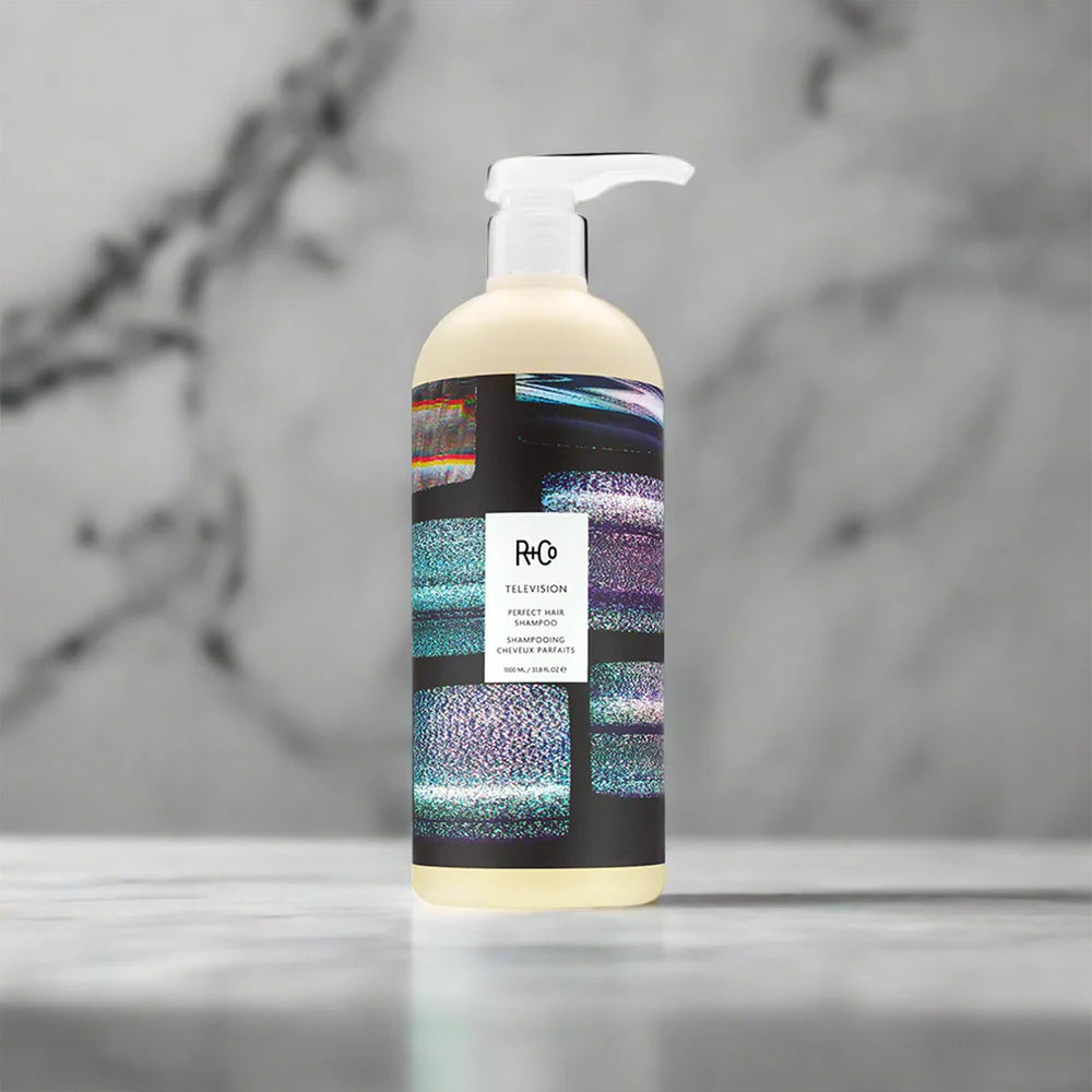 R+Co TELEVISION creamy lather texture close-up indicating gentle yet effective cleanse