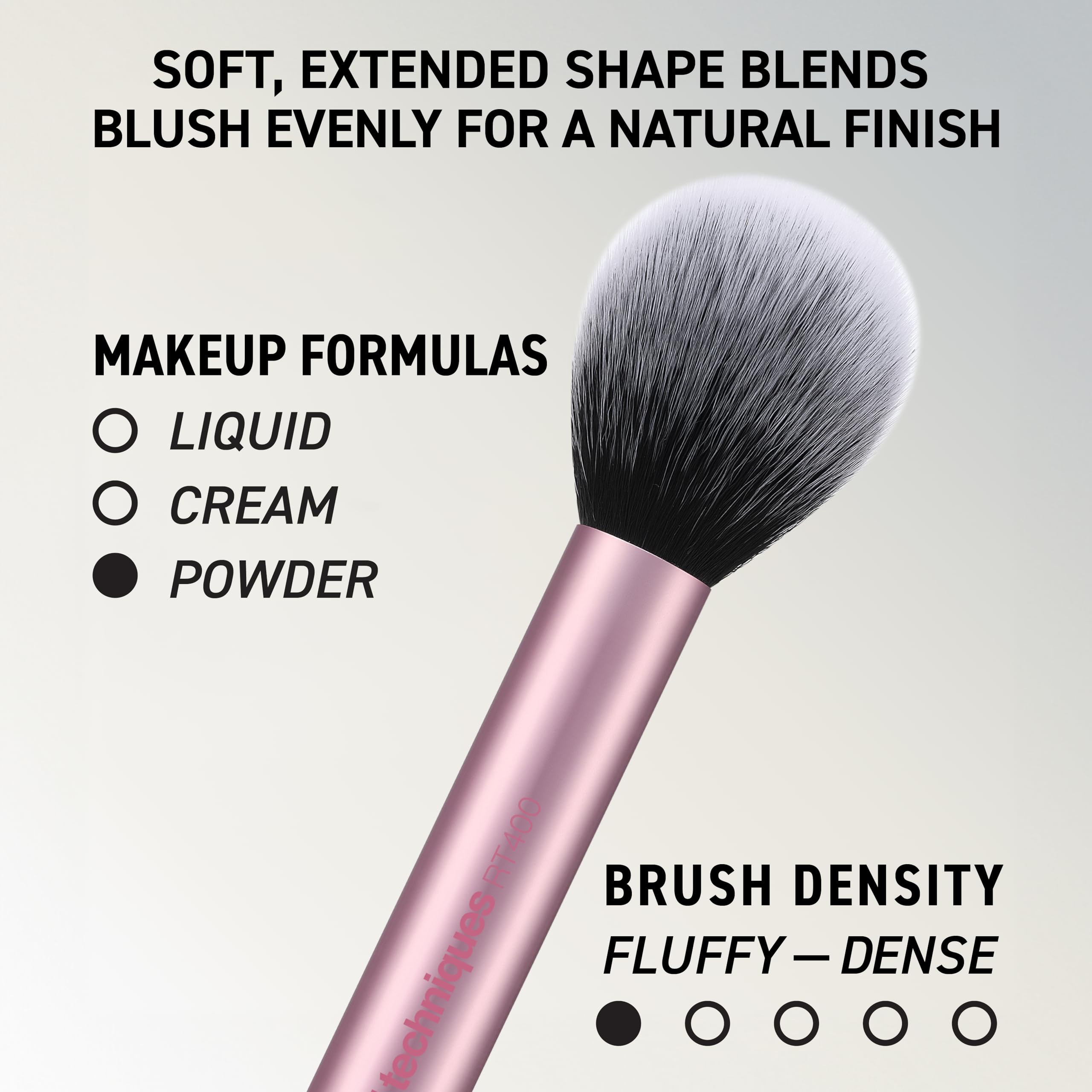 Real Techniques Blush Brush with product swirled on bristles for effortless color build
