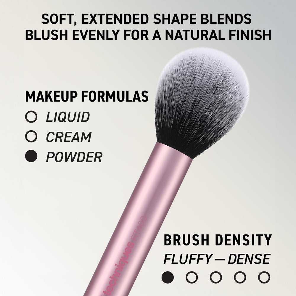 Real Techniques Blush Brush with product swirled on bristles for effortless color build