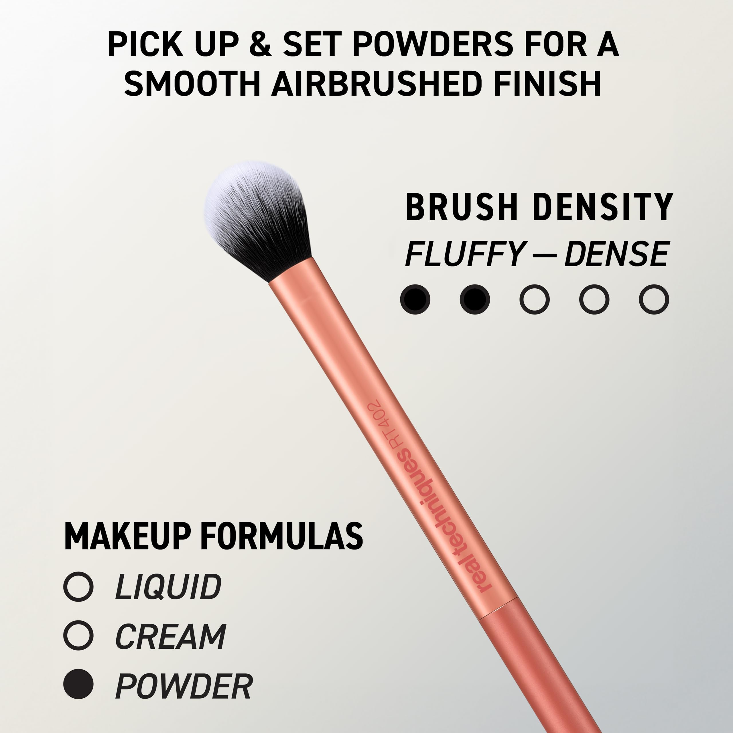 Real Techniques brushes held in hand showing size and portable convenience