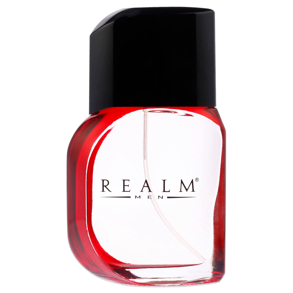 Close-up of mandarin and ginger notes highlighting Realm fragrance's bright spice