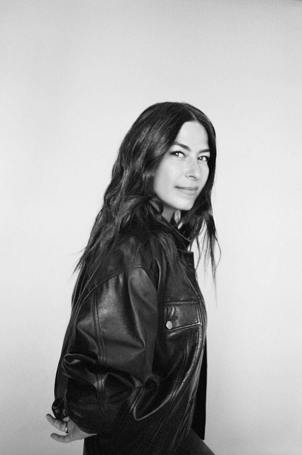 Rebecca Minkoff product boxed with bottle presenting gift-ready packaging and premium appeal