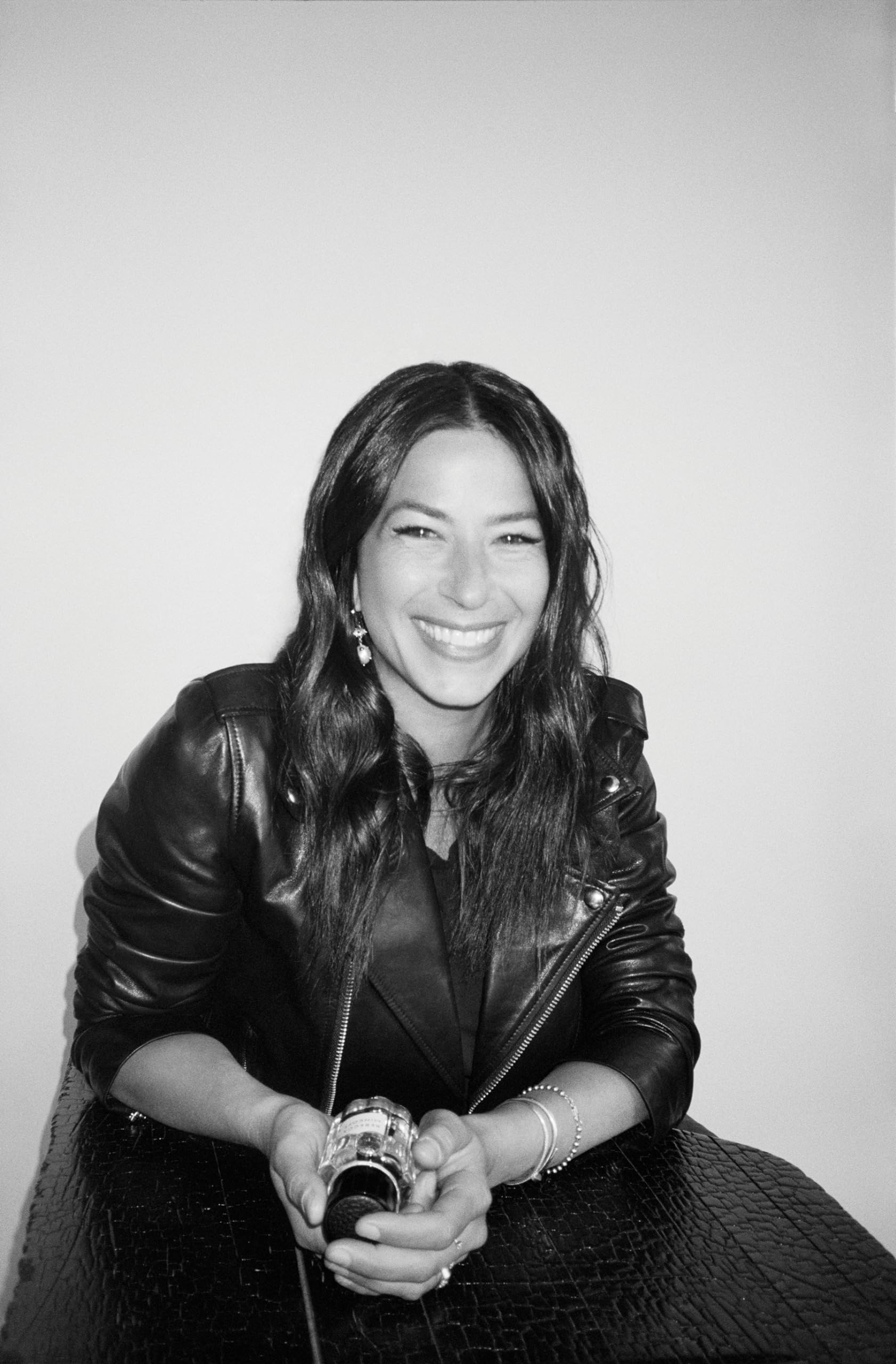Rebecca Minkoff evening scene showing mist as a warm, sensual finishing touch for night plans