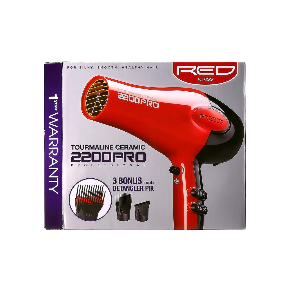 RED by Kiss dryer next to ruler for scale showing compact salon-grade size