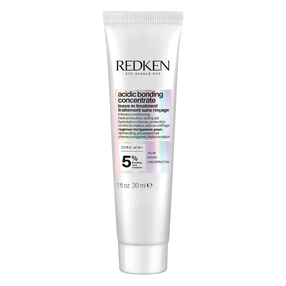 Redken bottle front packaging showing product and benefit of repair