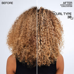 Close-up of Redken conditioner creamy texture for smooth detangling