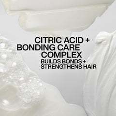 Redken mask being applied to wet hair for fast hydration and detangling benefit
