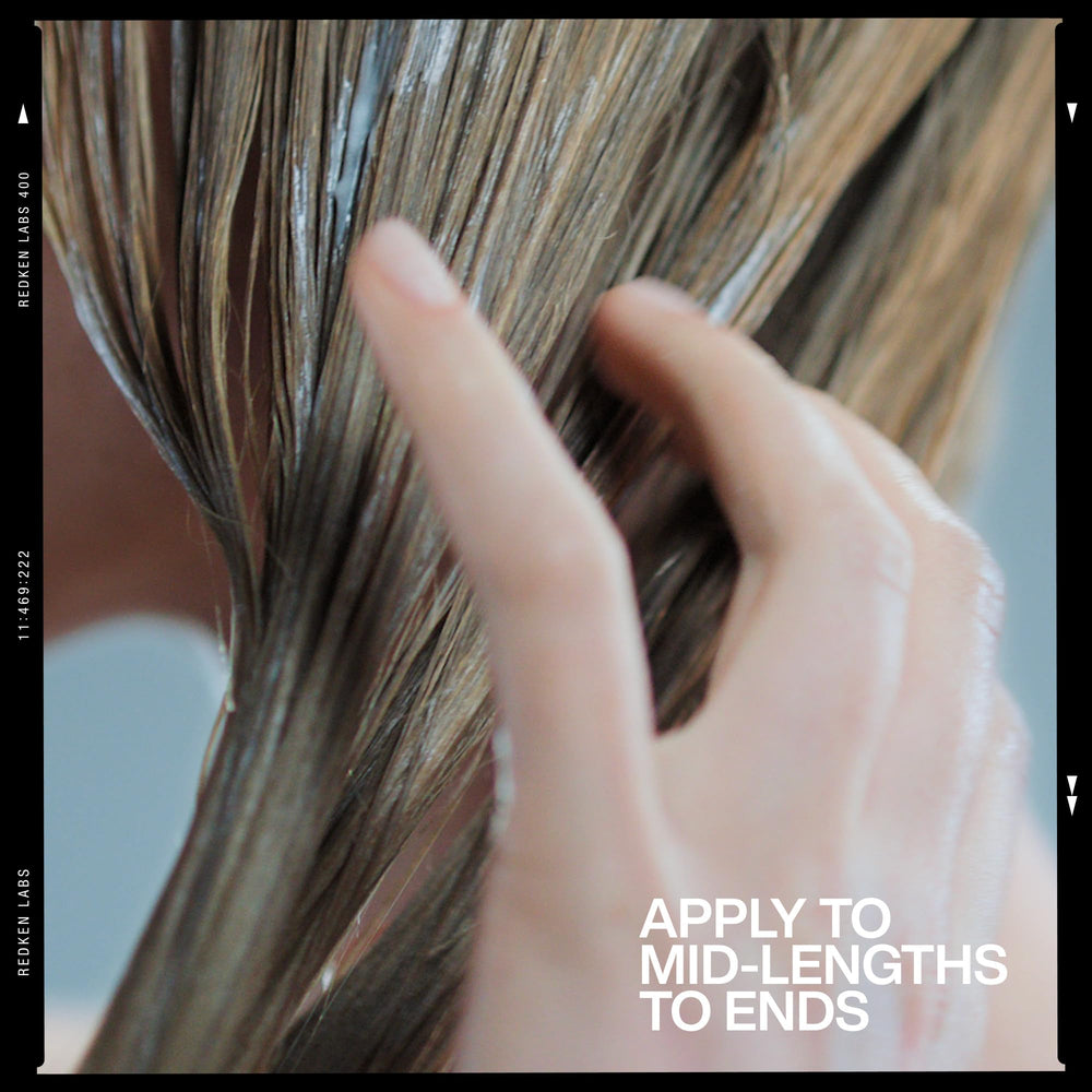 Redken acidic grow finished styled hair in lifestyle scene showing fuller, softer look