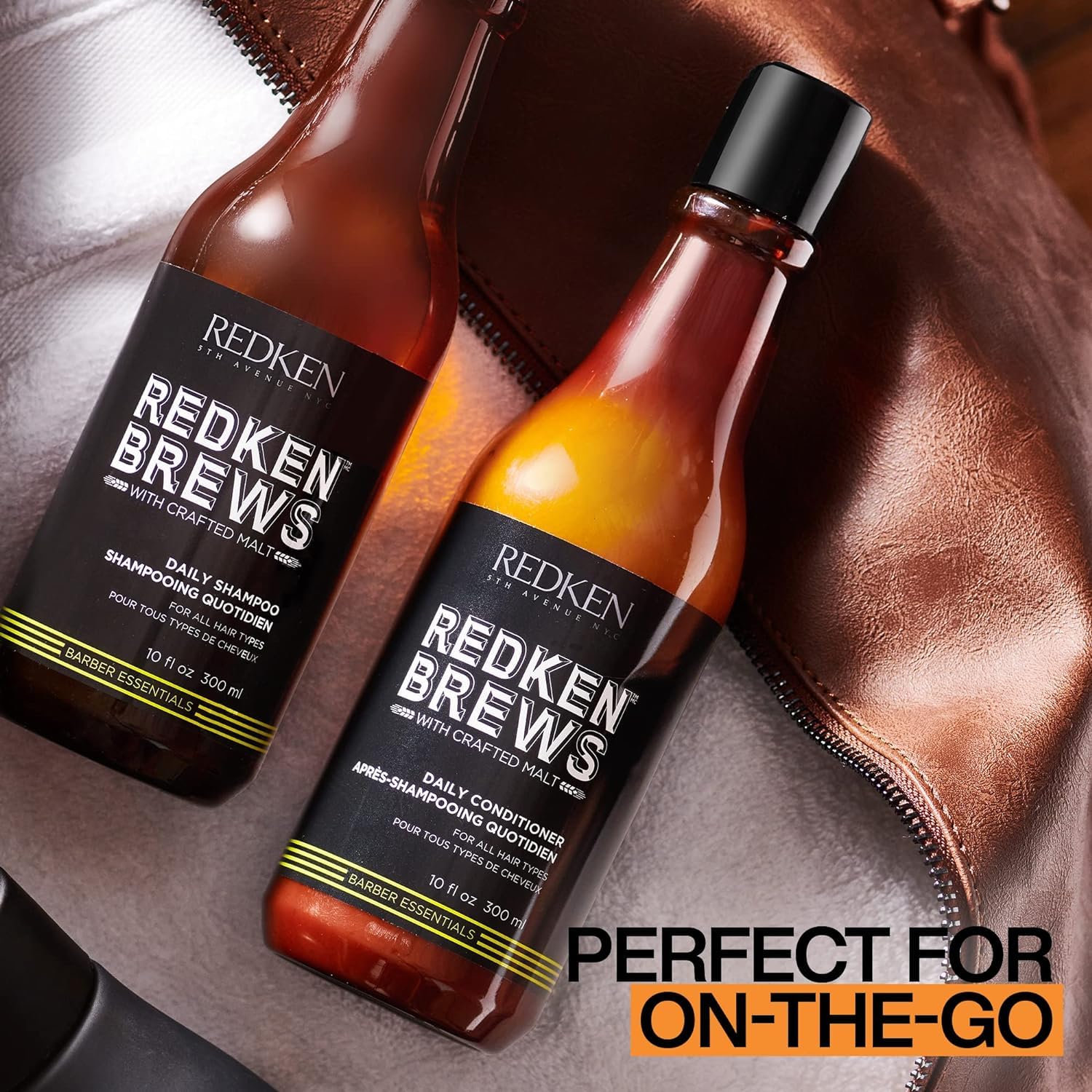Redken Brews bottle held for scale showing convenient size and travel-friendly benefit