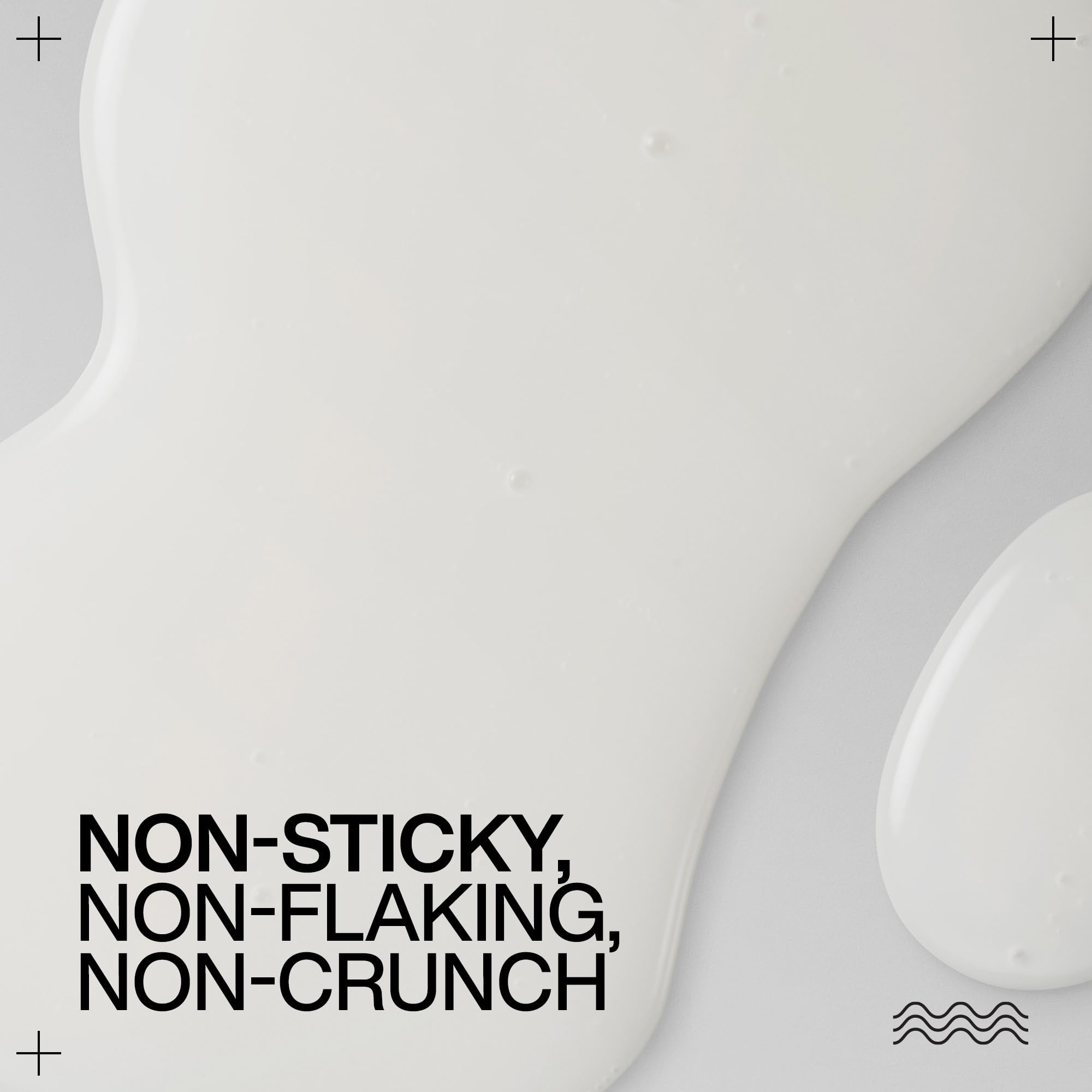 Redken product label closeup showing key ingredients and clean formula benefit