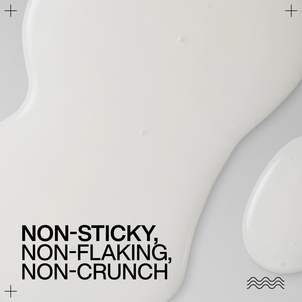Redken product label closeup showing key ingredients and clean formula benefit