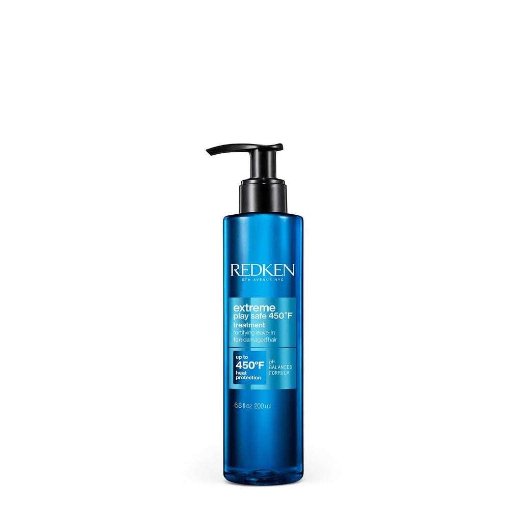Redken bottle front packaging showing product and benefits