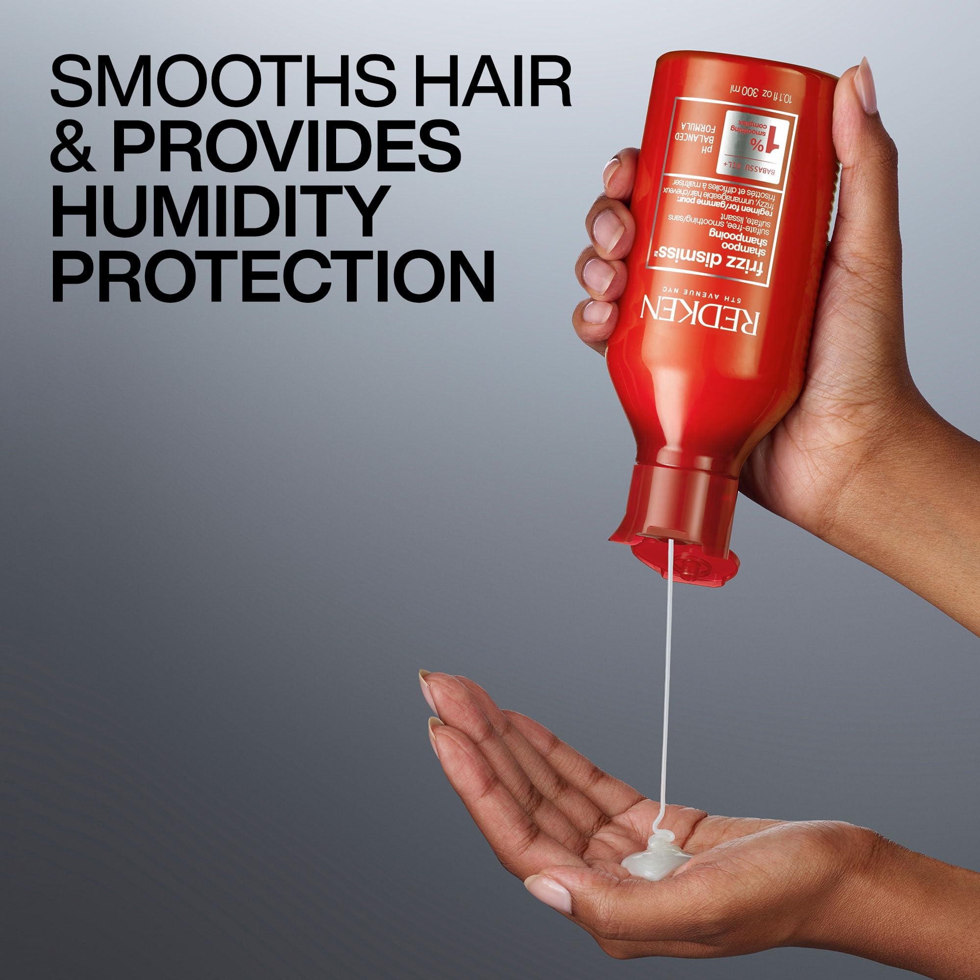 Redken Frizz Dismiss bottle on shower shelf illustrating everyday use benefit