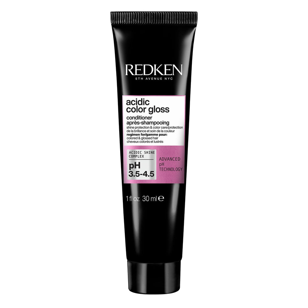 Redken front bottle showing product and compact size for travel