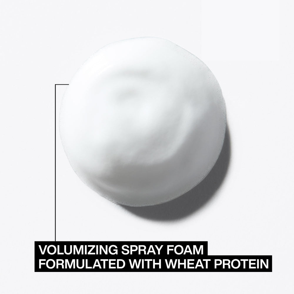 Redken root lifter in use while blow-drying for lifted roots