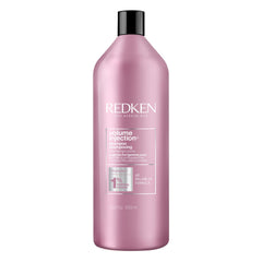 Redken bottle front view showing product and benefits