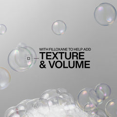 Redken shampoo lather texture demonstrating gentle cleansing and lift