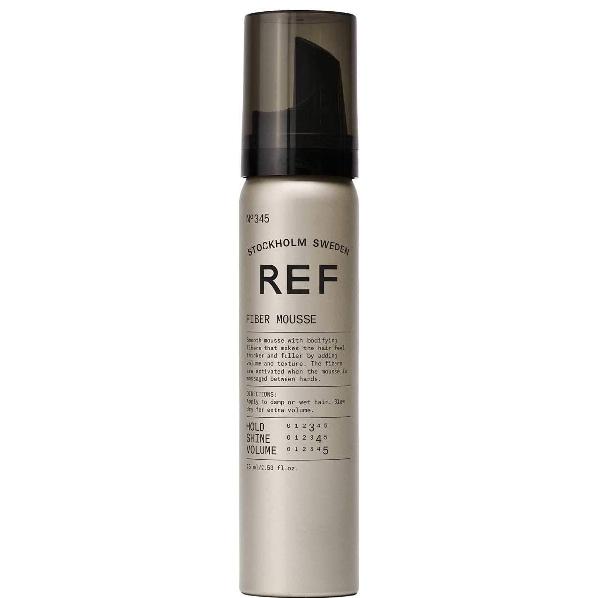 REF 345 Fiber Mousse foam on hands demonstrating activation and workable texture