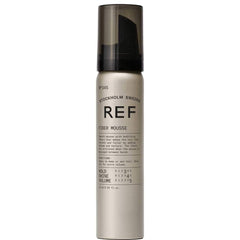 REF 345 Fiber Mousse foam on hands demonstrating activation and workable texture