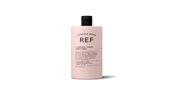 REF applying conditioner to damp hair demonstrating detangling and shine benefits