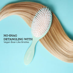 Remilia Hair close-up of vegan boar-like bristles demonstrating smooth detangling