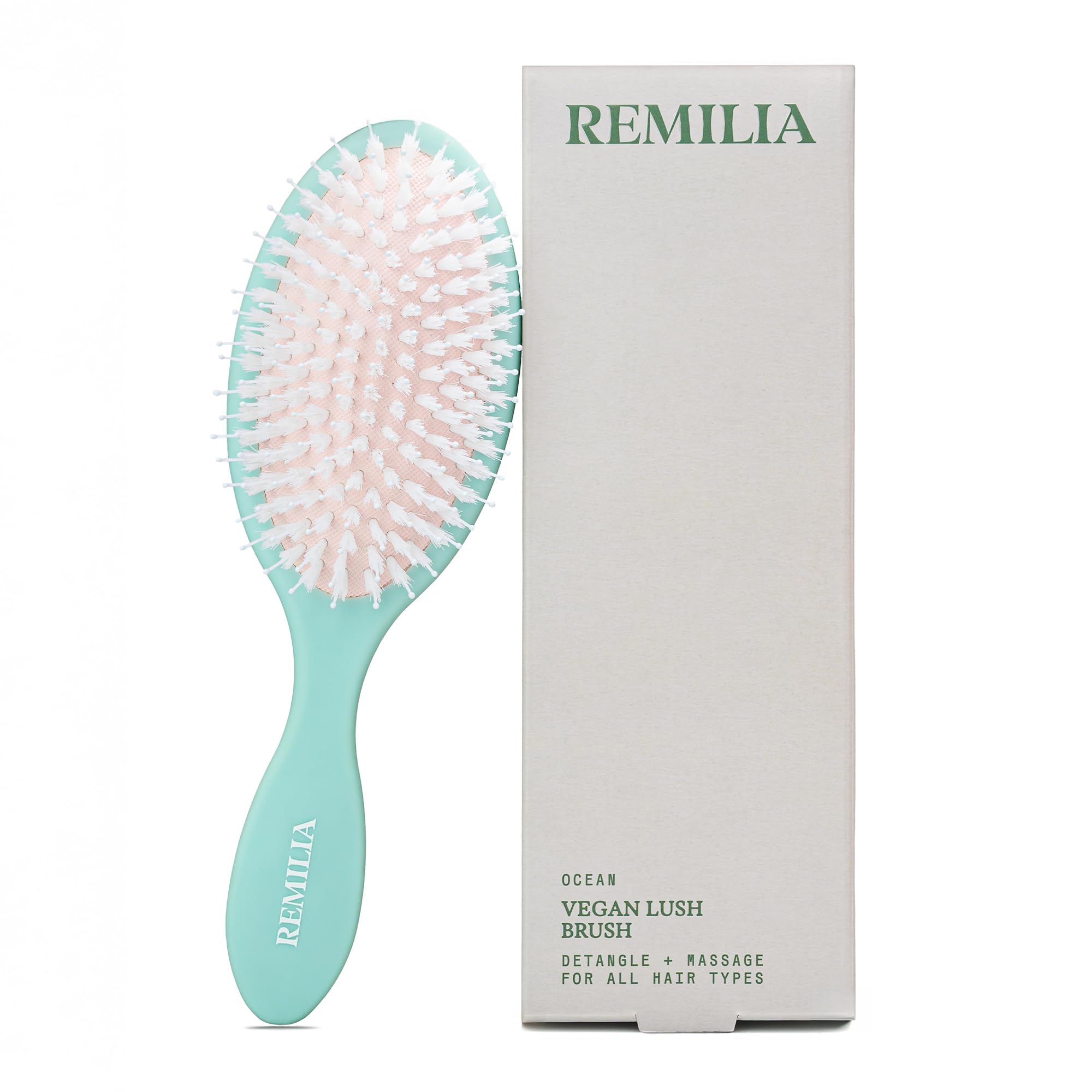 Remilia Hair paddle brush front view showing sleek vegan design and easy grip