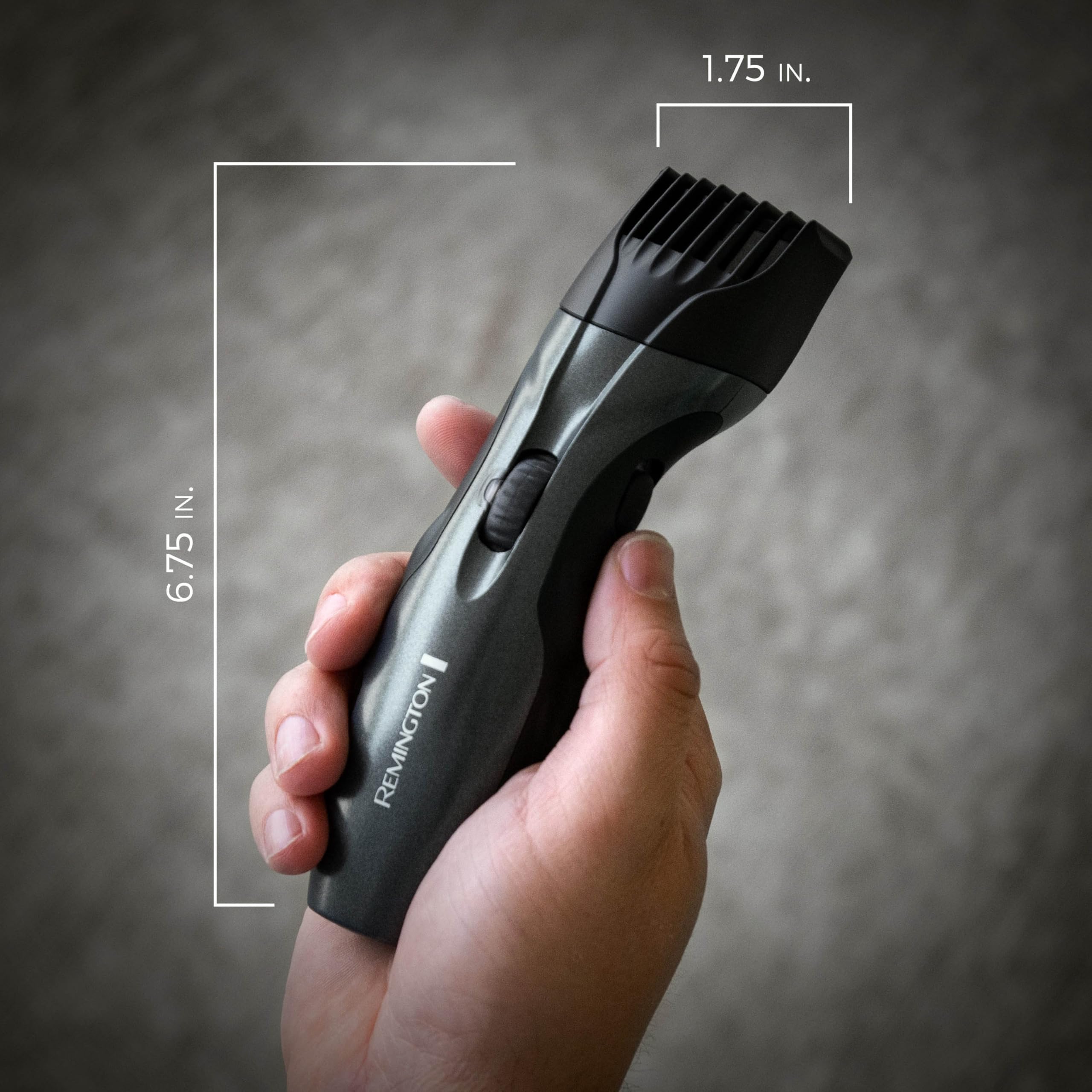 Remington trimmer next to ruler showing compact size and portability