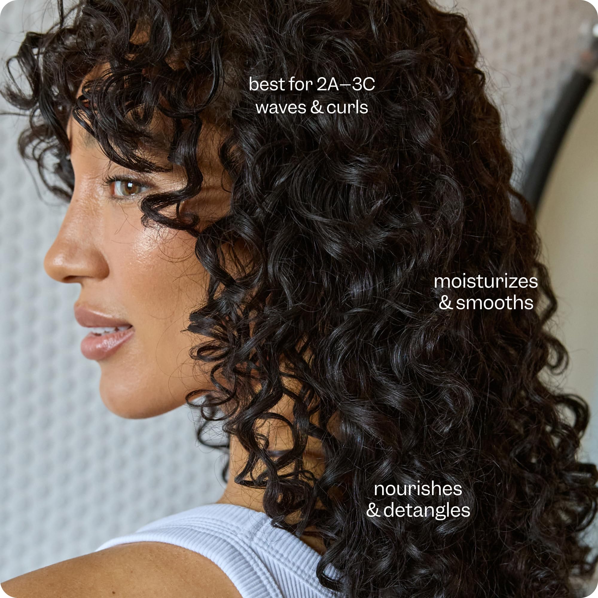 Renpure in-shower use on wet curly hair for improved definition