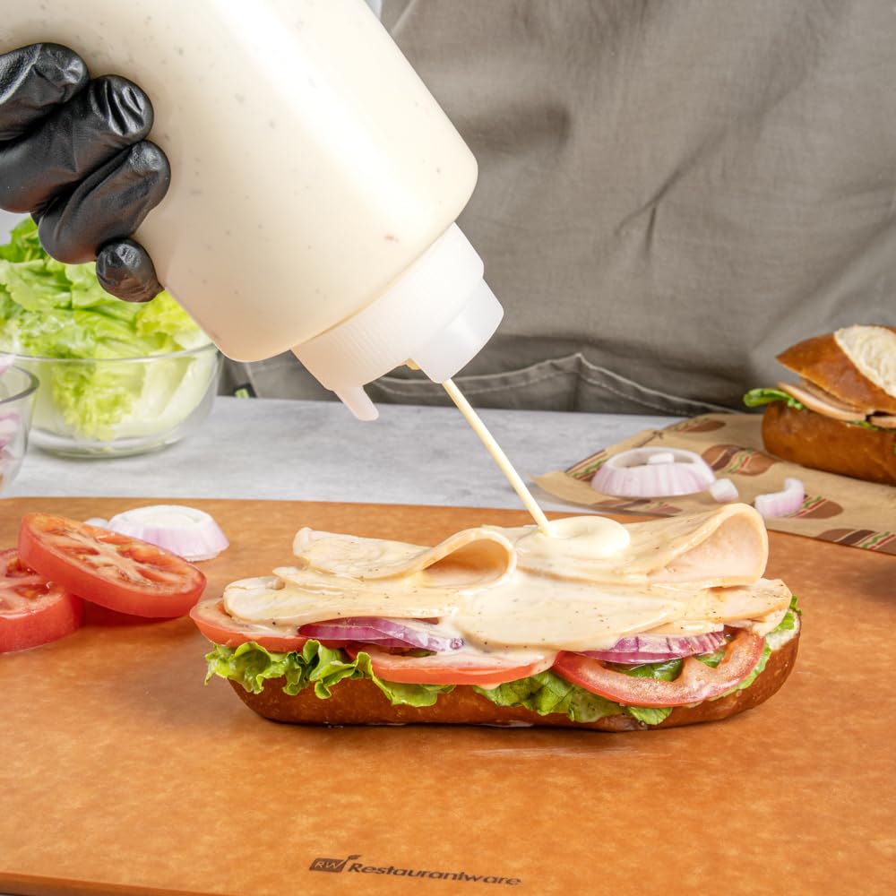 Restaurantware bottle seated in prep rail for organized service and space saving