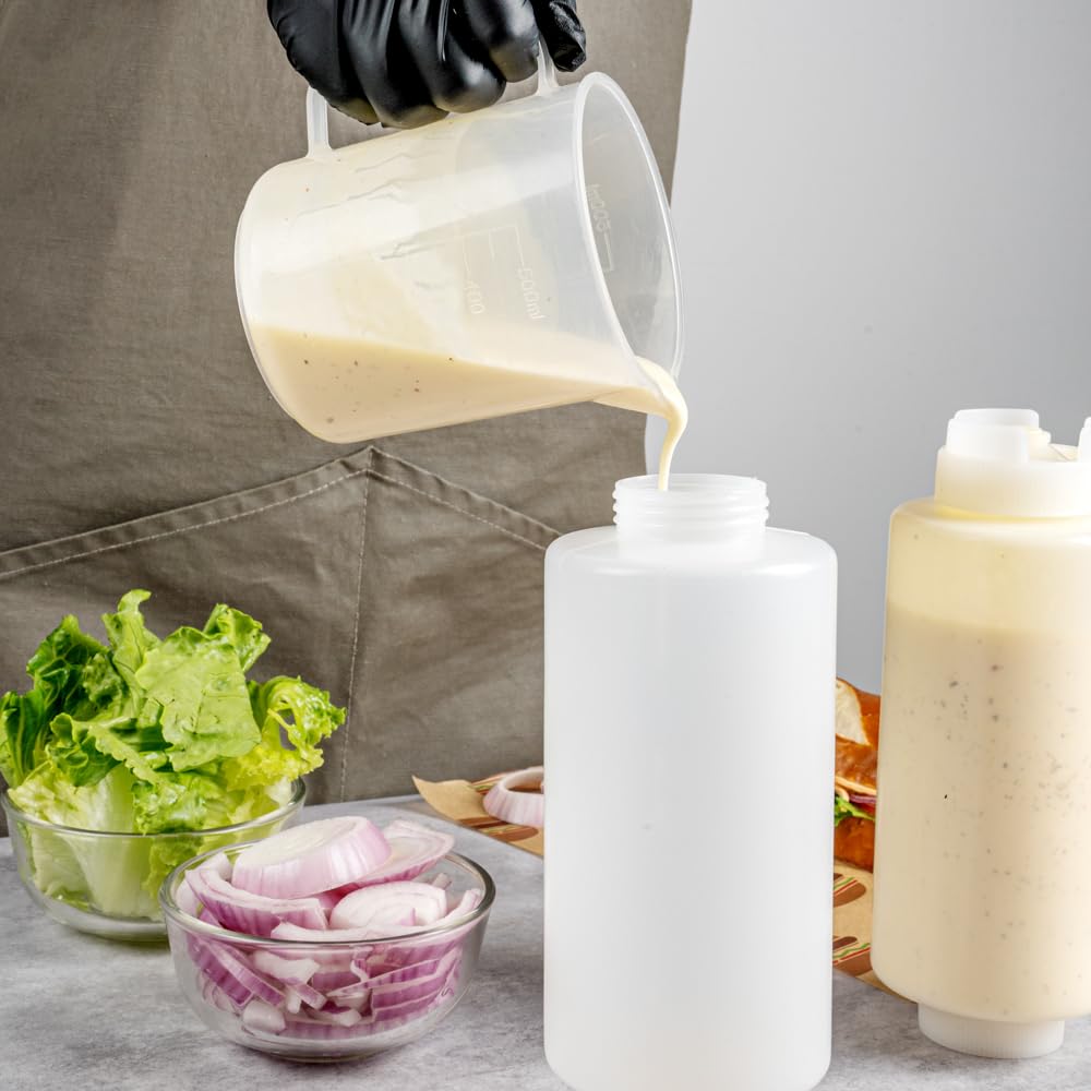 Restaurantware size comparison with hand holding bottle to show 32 oz capacity and scale