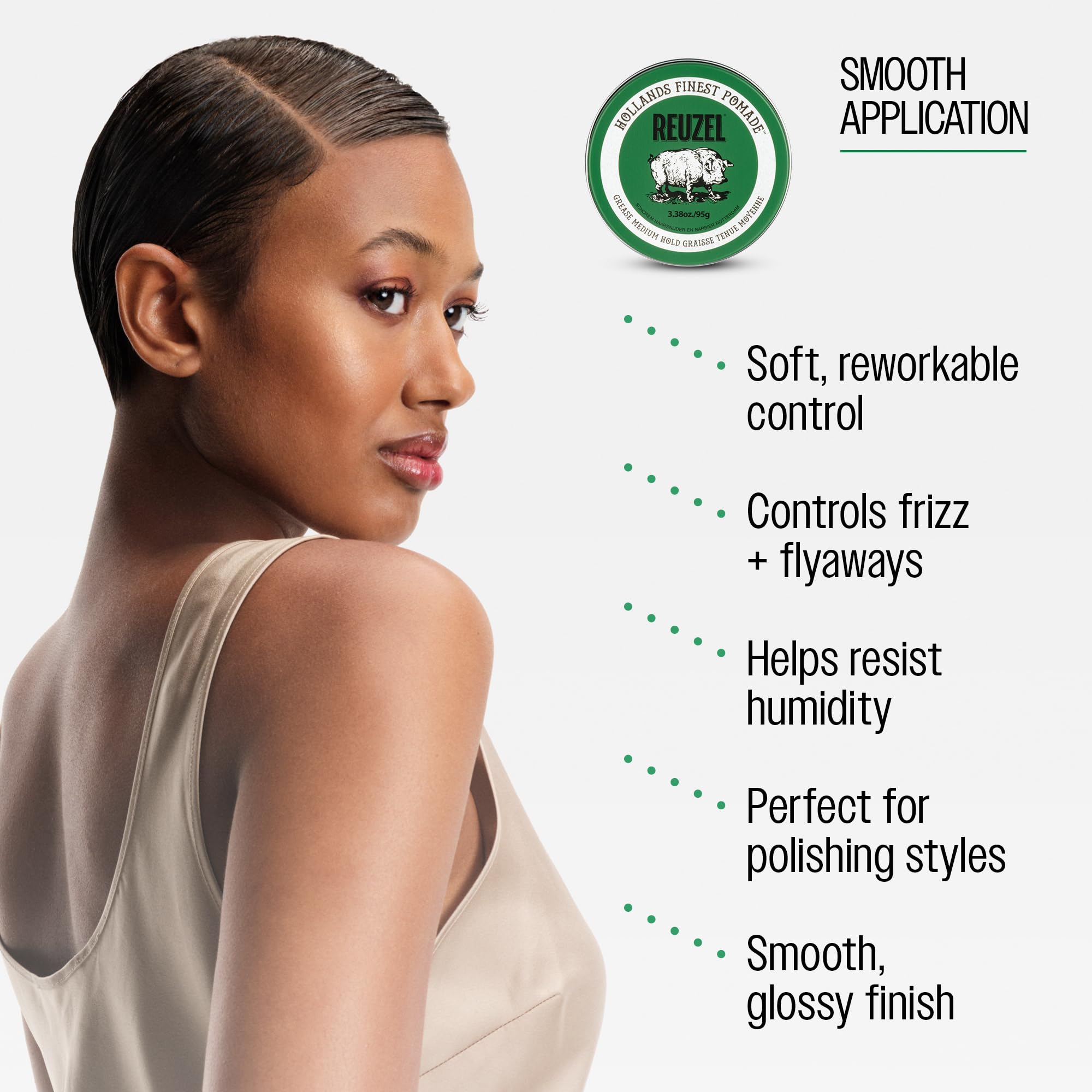 REUZEL being applied with a comb through hair, shows even distribution and hold