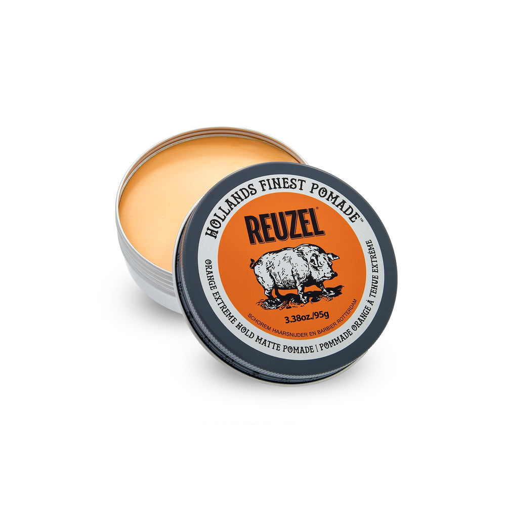 REUZEL applied in hair demonstrating firm hold and definition