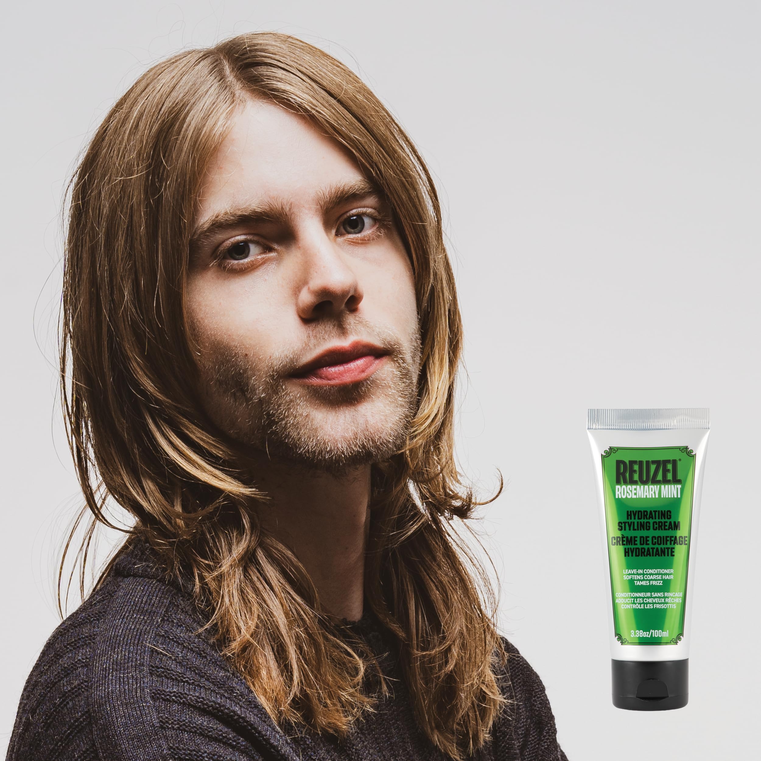 REUZEL product next to ruler to show 3.38 oz size and travel-friendly benefit