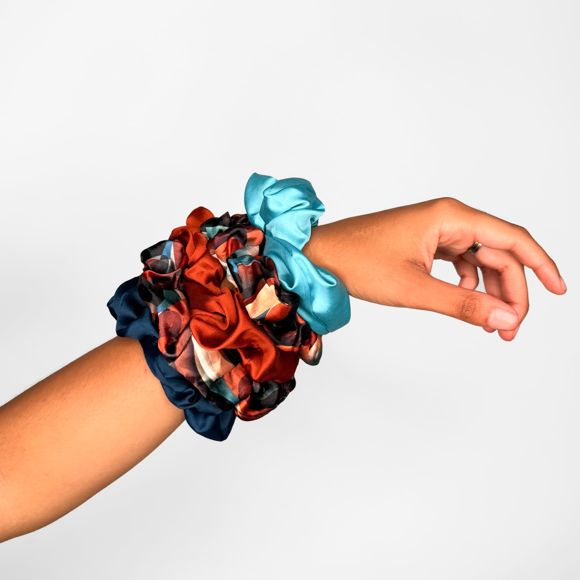 REVAIR Cinnamon Swirl worn in a ponytail demonstrating secure hold without pulling benefit