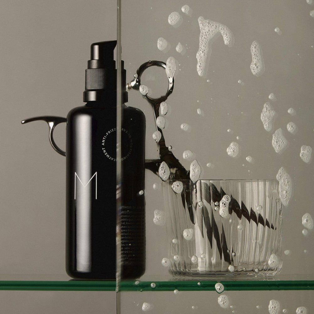 REVERIE bottle on recycled packaging, eco-friendly materials highlighted