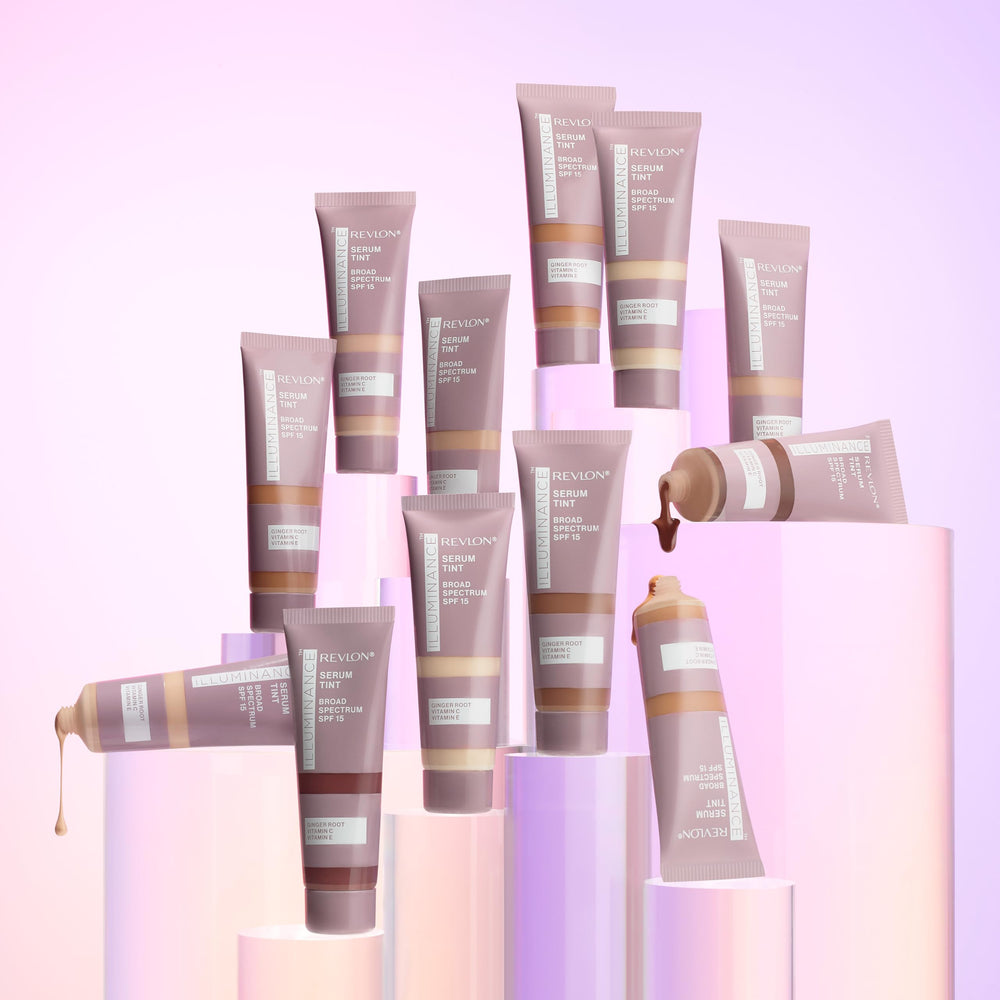 Revlon Illuminance bottle held in hand showing compact 0.94 fl oz travel-friendly benefit