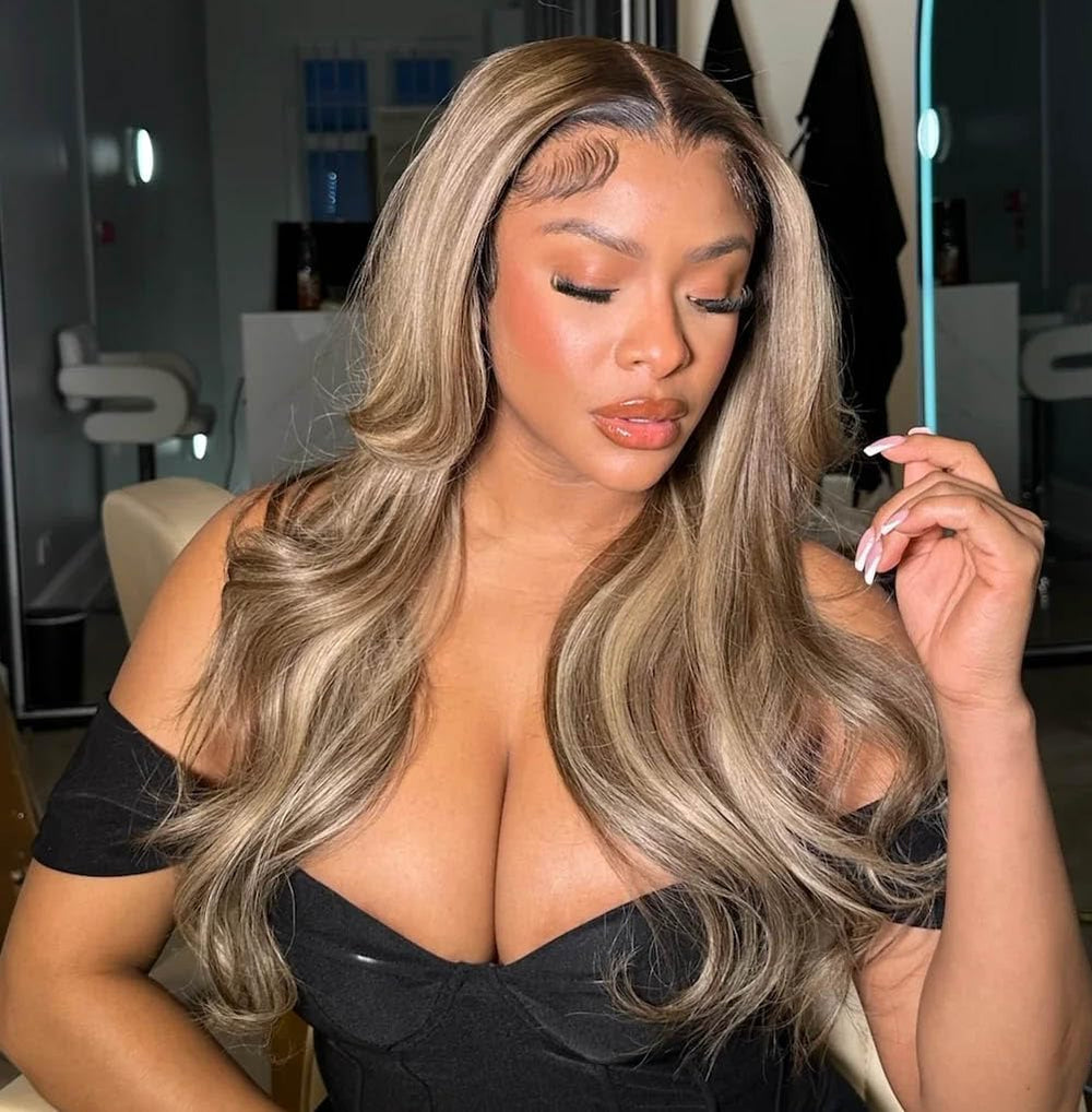 Rina styled updo showcasing ombre ash blonde with brown highlights for events