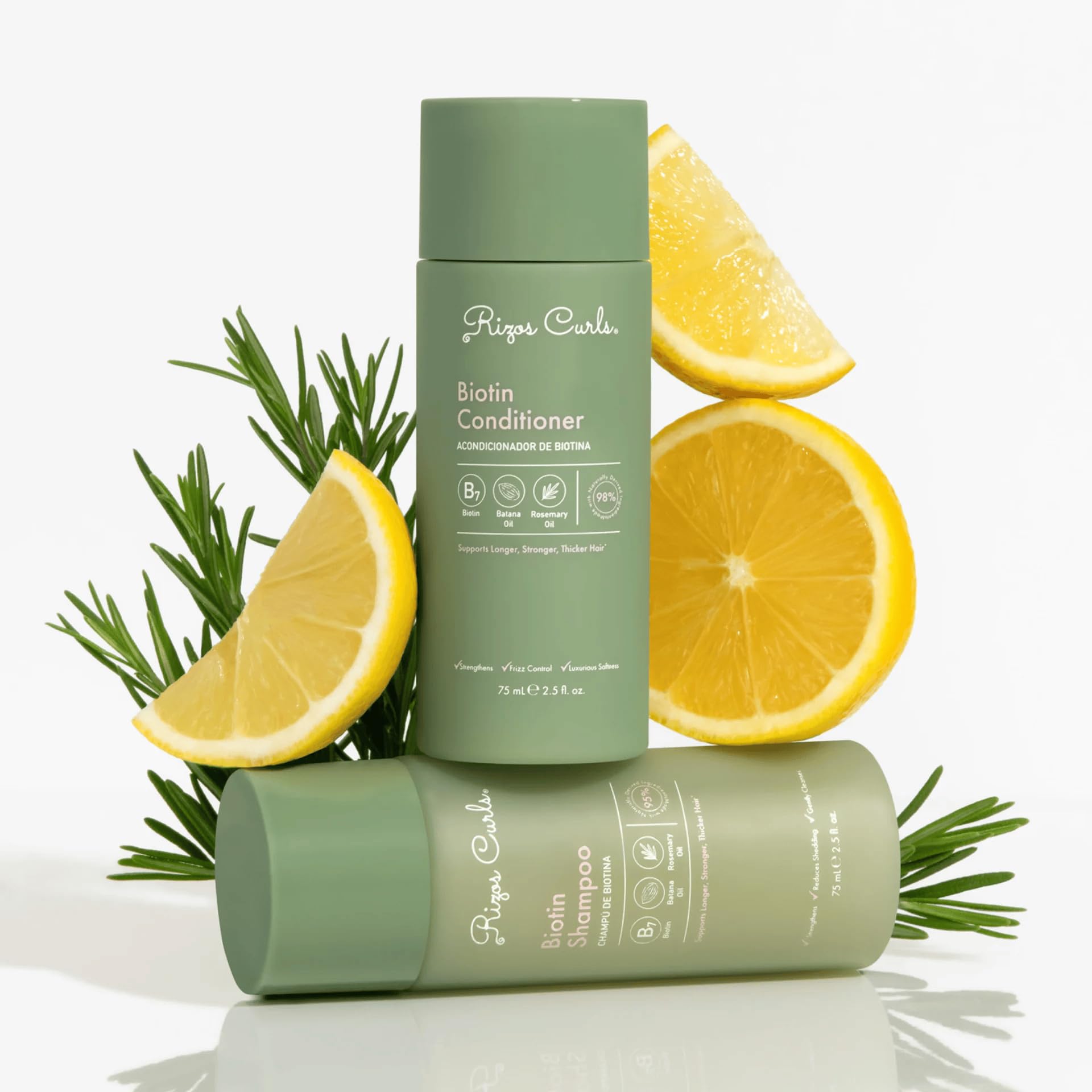 Rizos Curls bundle next to passport and toiletries showing travel-friendly size and convenience