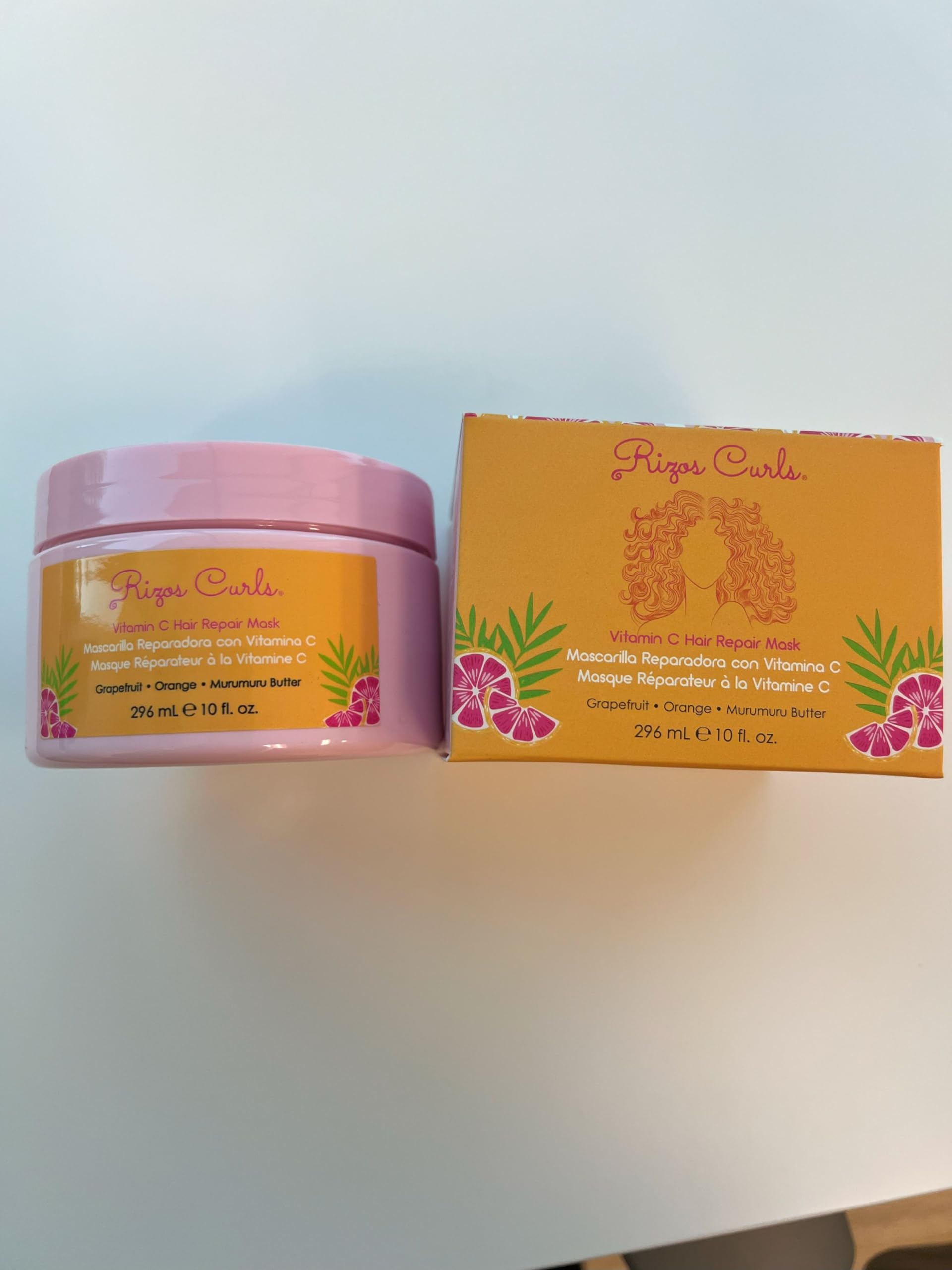 Rizos Curls with citrus and butter ingredients illustrating nourishing components